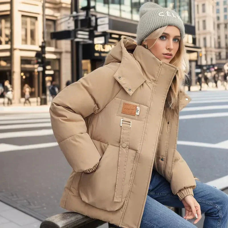 Hainie Women’s Waterproof Puffer Jacket – Oversized Winter Coat with Hood & High Collar