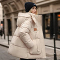 Hainie Women’s Waterproof Puffer Jacket – Oversized Winter Coat with Hood & High Collar