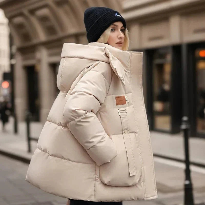 Hainie Women’s Waterproof Puffer Jacket – Oversized Winter Coat with Hood & High Collar